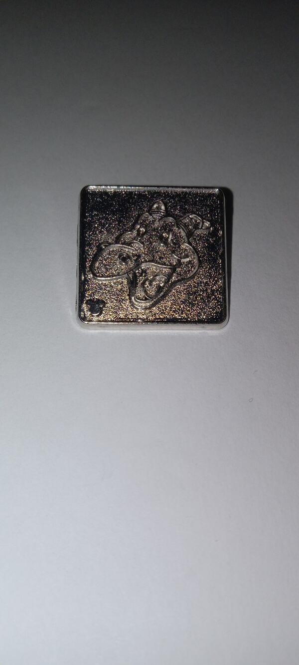 Disney silver figment square.